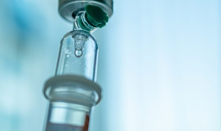 IV bag prepared for in-home hydration therapy administered by a licensed nurse through House Call The App in South Florida.